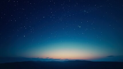 A twilight sky transitioning from blue to deep indigo, scattered with the first stars of the galaxy emerging above the horizon.