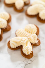 Creating Gingerbread Cookie Sandwiches with Buttercream Filling