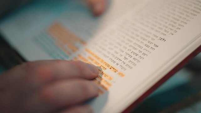 Jewish books reading turning pages of Torah