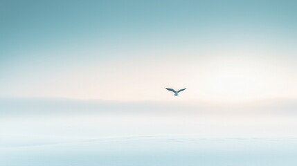Fototapeta premium Vogel über schneebedeckter Landschaft