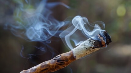 Smoke spirals rising from a traditional Native American pipe