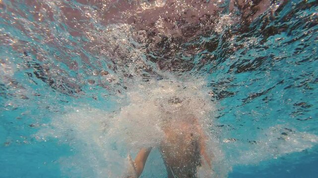 Happy Little Boy Jumping Pool Blue Clear Water. Summer Swim, Underwater Leisure