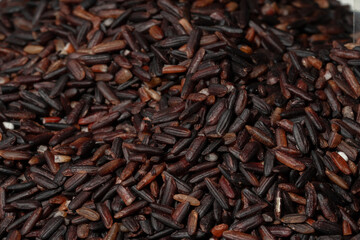 Raw Black Rice Grains Closeup | Super Food Wild Black Rice Background