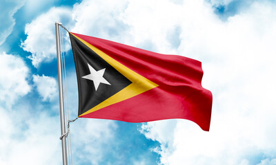 East Timor flag waving on sky background. 3D Rendering