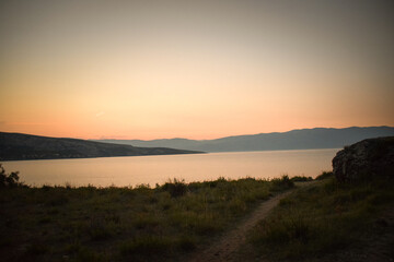 sunrise over the sea, clear sky without clouds. golden hour.	