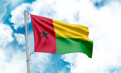 Guinea-Bissau flag waving on sky background. 3D Rendering