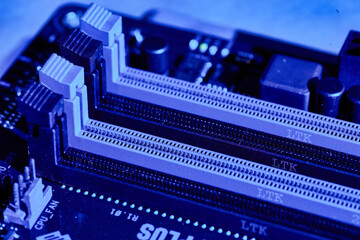 RAM Slots on Motherboard with Blue Lighting
