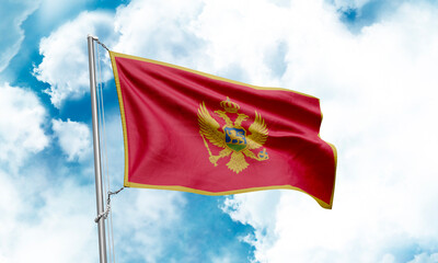 Montenegro flag waving on sky background. 3D Rendering