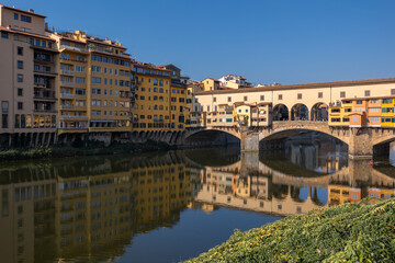 Medieval architectural heritage Ponte Vecchio old bridge with colorful buildings, Florence, Italy