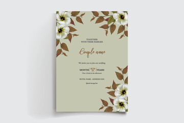 WEDDING INVITATION FRAME WITH FLOWER DECORATIONS AND FRESH LEAVES 