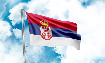 Serbia flag waving on sky background. 3D Rendering