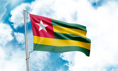 Togo flag waving on sky background. 3D Rendering