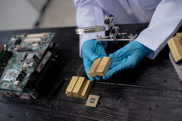 Technicians meticulously repair electronic components to turn them into precious gold. This process...