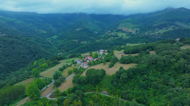 Aerial view from a drone of the landscape around the village of Veguilla in the municipality of Reoc&iacute;n. Hills of Ason Natural Park. Soba Valley. Cantabria. Spain. Europe