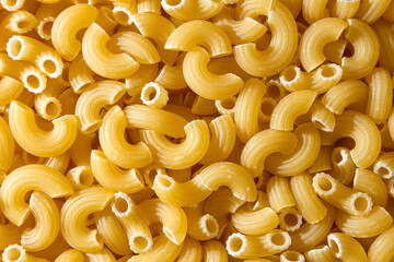Uncooked Chifferi Rigati Pasta: A Culinary Canvas of Chifferi Rigati, Creating a Lively and Textured Background for Gourmet Cooking. Dry Pasta. Raw Macaroni - Top View, Flat Lay