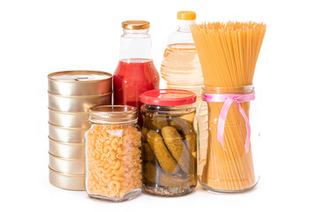 Food Reserves: Canned Food, Spaghetti, Pate, Tuna, Tomato Juice, Pasta, Fish and Grocery - Isolated on White Background. Emergency Food Storage in Case of Crisis. Strategic Food Supplies - Isolation