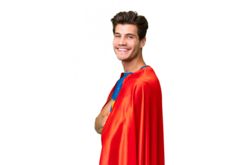 Super Hero caucasian man over isolated background with arms crossed and looking forward
