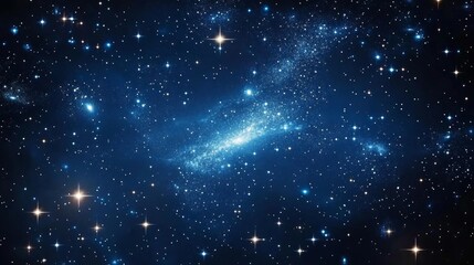 Obraz premium A dark blue night sky filled with twinkling stars. The image shows a sparkling galaxy with a constellation of stars against a cosmic background.