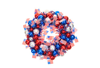 Patriotic wreath with tinsel stars and christmas balls isolated on white for Independence Day or celebrate July 4th.