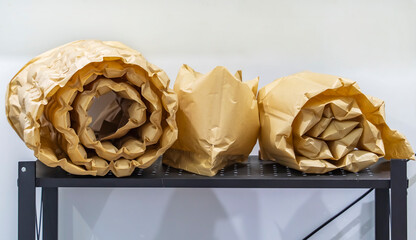 biodegradable inflatable paper air pillows system for optimal protection of a product during...