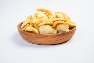 A bowl of food with a lot of pieces of food in it
