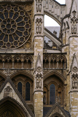 Gothic Cathedral Facade with Rose Window and Detailed Stone Sculptures