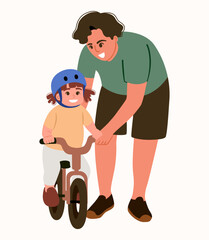 Caring dad teaching daughter to ride bike 