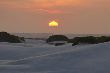 Sunset between the dunes in Lençóis Maranhense.