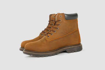 Brown leather boots on white background. Fashion 