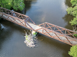 view of wallkill valley rail trestle bridge over river (aerial drone view) hudson valley rail trail...