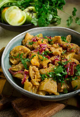 fried green tomatoes, with onions and spices, green tomato appetizer, Georgian cuisine, homemade, no people,