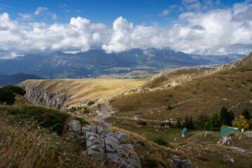 P14 road in the Durmitor Mountains. The Dinaric Alps also Dinarides, are a mountain range in Southern and Southcentral Europe, separating the continental Balkan Peninsula from the Adriatic Sea. 