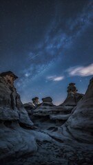 Stunning Nightscapes: Meteor Streaks, Hoodoo Rock Formations, and the Milky Way Over Orange Cliffs