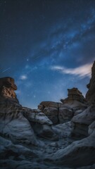 Naklejka premium Stunning Nightscapes: Meteor Streaks, Hoodoo Rock Formations, and the Milky Way Over Orange Cliffs