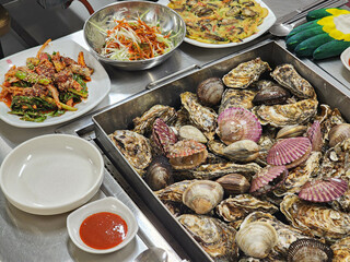 Korean Seafood Food. Steamed oysters and clams