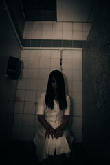 Portrait of asian woman make up ghost face with blood,Horror scene,Scary background,Halloween...