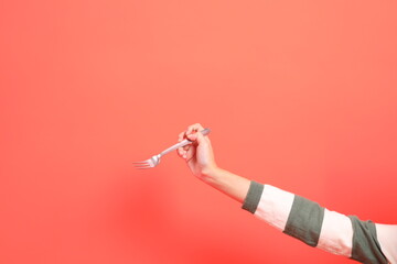 Hands holding fork