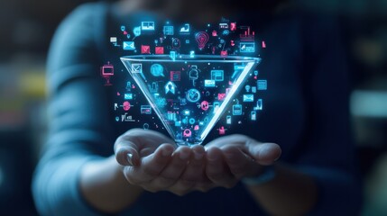 Person holding a digital marketing funnel with icons of digital marketing elements for the Concept of converting sales process prospects into customers.