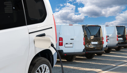 Electric delivery vans with electric vehicles charging station