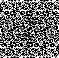 Small uneven spots and particles of debris. Abstract vector texture.  Distressed uneven background. Grunge texture overlay with fine grains isolated on white background. Vector illustration. EPS10.