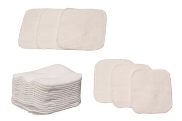 Stack of white cotton sponges isolated on a white background.