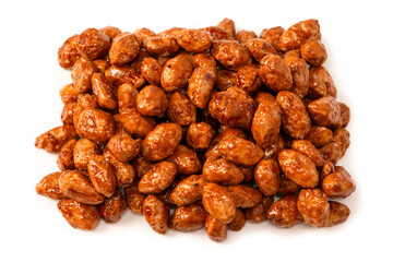 Tasty sweet roasted peanuts isolated on a white background.