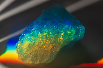 Aquamarine raw crystal in prism light