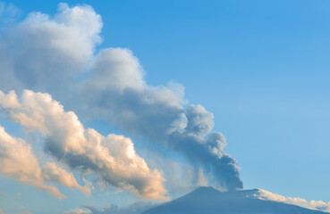eruption of volcano with clouds of ash, volcanic mountain erupting with cloud of fire ash and smoke...