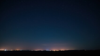 Fototapeta premium Starry Night Sky Over Urban Landscape