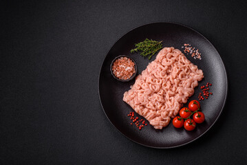 Fresh raw chicken mince with salt, spices and herbs
