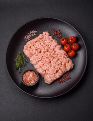 Fresh raw chicken mince with salt, spices and herbs