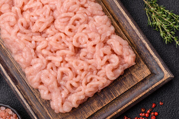 Fresh raw chicken mince with salt, spices and herbs