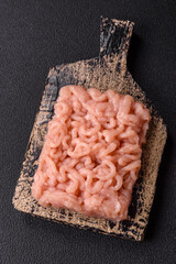 Fresh raw chicken mince with salt, spices and herbs