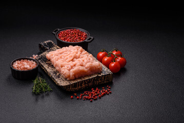 Fresh raw chicken mince with salt, spices and herbs